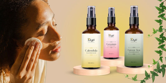 A skincare image showing the benefits of skincare with a woman applying product to her cheek. Three Kiyo Beauty natural facial mists or Hydrosols—Calendula, Geranium, and Green Tea (100ml)—are displayed next to her.